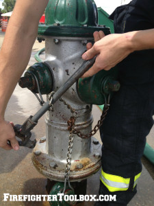 Image demonstrating twisting around hydrant wrench.